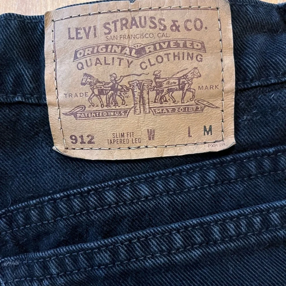 Vtg Levi's Orange tab 912 slim fit tapered leg high waisted mom jeans black 11 M